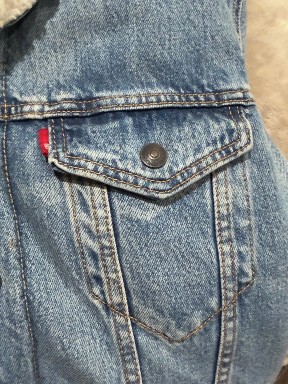 Levi's Light Blue Denim Sherpa-Lined Trucker Jacket with Cream Collar